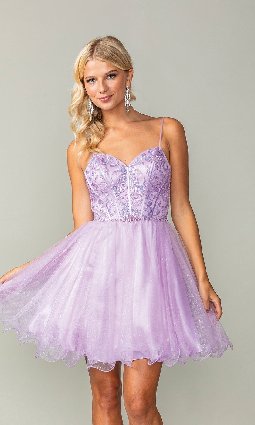 A woman poses against a plain light background in the Lace-Up Short Babydoll Homecoming Dress 3352, featuring a light purple color, sleeveless design, spaghetti straps, and a fitted embroidered corset-style bodice.